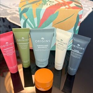 Travel Size: Origins Skincare Collection with Red, Green, Blue, and Orange